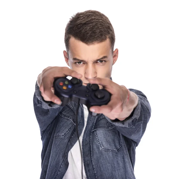 Joven jugando en consola o computadora . —  Fotos de Stock