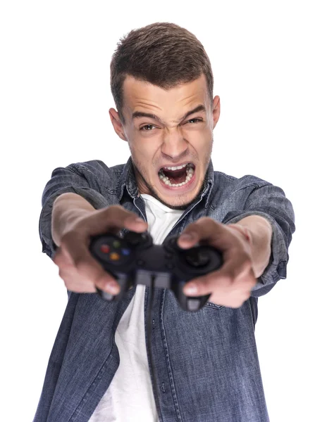 Joven jugando en consola o computadora . —  Fotos de Stock