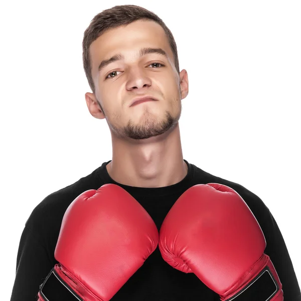 Młody człowiek w czerwone Rękawice bokserskie. — Zdjęcie stockowe