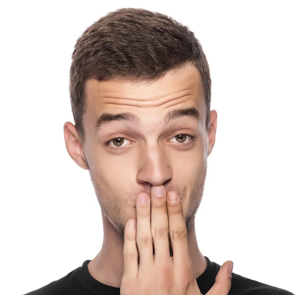 Man with hand covering his mouth. — Stock Photo, Image