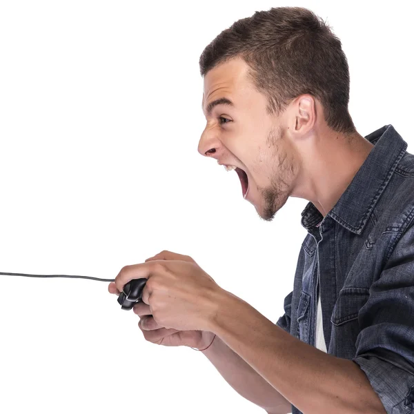 Joven jugando en consola o computadora . —  Fotos de Stock