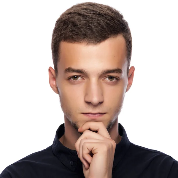 Young handsome man in a dark shirt. — Stock Photo, Image