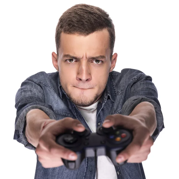 Joven jugando en consola o computadora . —  Fotos de Stock