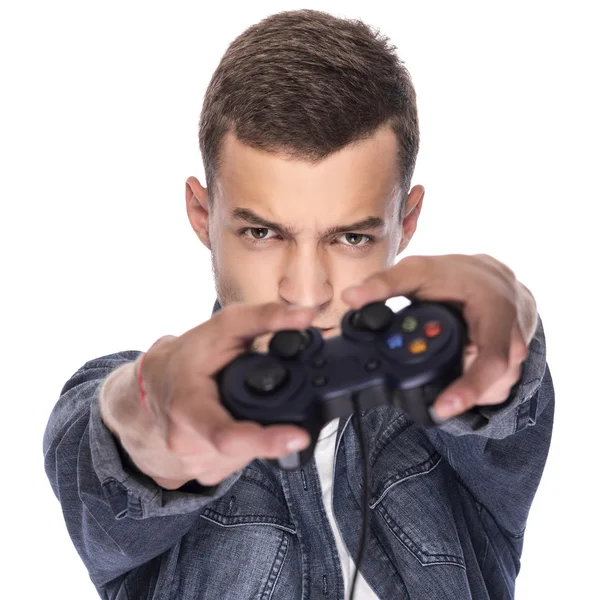 Joven jugando en consola o computadora . —  Fotos de Stock