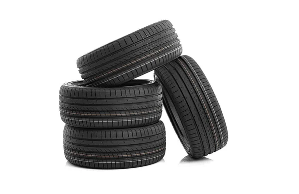 Neumáticos de coche sobre fondo blanco. —  Fotos de Stock