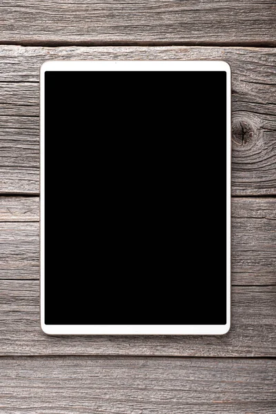 Ahşap arkaplanda beyaz tablet — Stok fotoğraf