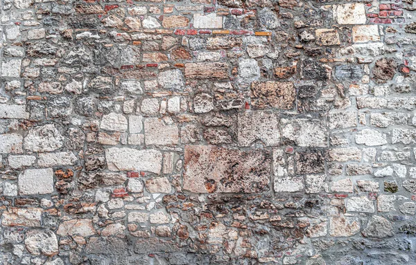 Pared de ladrillos grises viejos y piedra como fondo abstracto —  Fotos de Stock