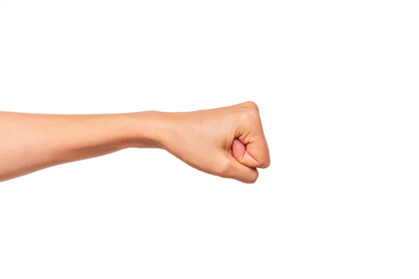 Female hand clenched into a fist isolated on a white background. — Stock Photo, Image