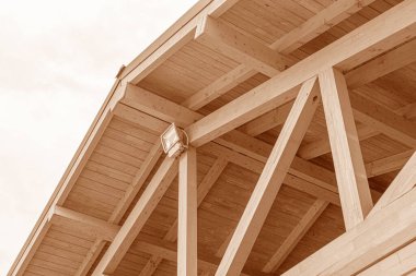 Wooden roof structure. Glued laminated timber roof. clipart