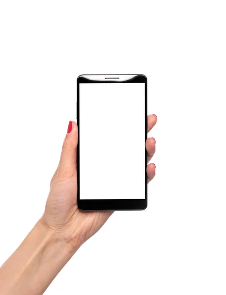 Smartphone com uma tela branca em uma mão feminina isolada em um branco. — Fotografia de Stock