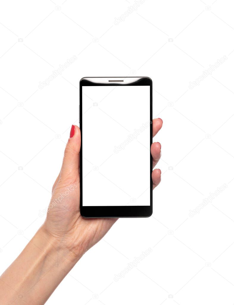 Smartphone with a white screen in a female hand isolated on a white.