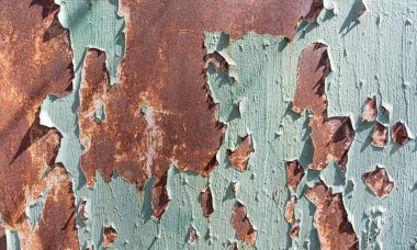 Soyulmuş boyalı paslı eski metal dokusu soyut arkaplan gibi.