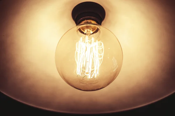 Old dusty light bulb — Stock Photo, Image