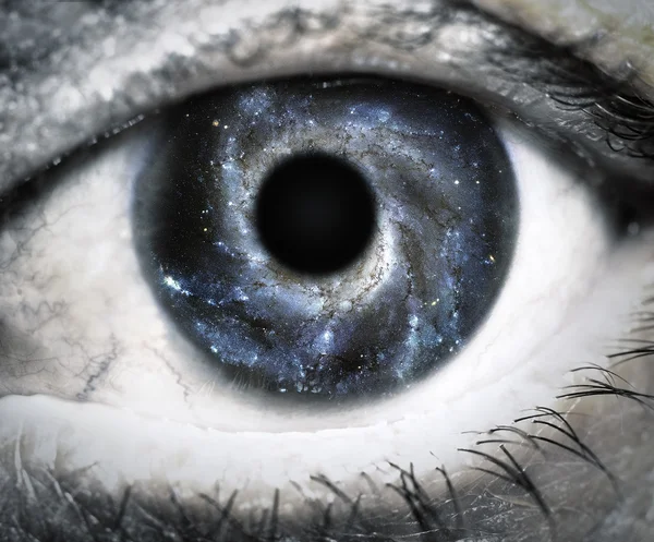 Human eye looking in Universe. — Stock Photo, Image