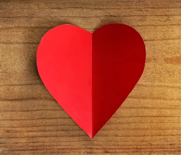 Red heart on a wooden background. — Stock Photo, Image