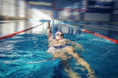 Swimmer swimming backstroke  clipart