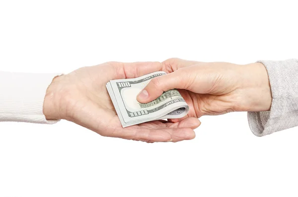 Hand giving money to other hand. — Stock Photo, Image