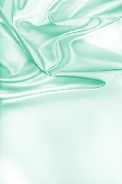 Текстура зелёной шелковой ткани — стоковое фото