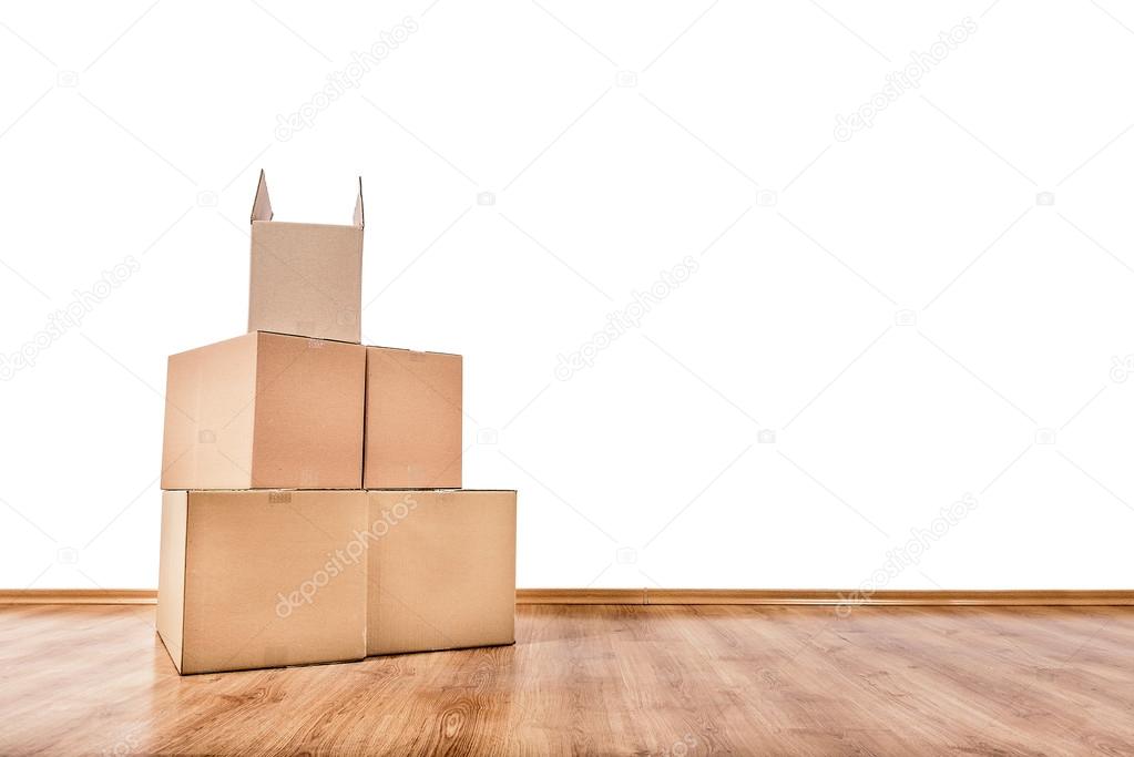 Moving boxes on the floor.