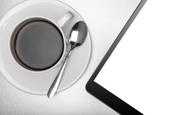 Tablet pc and cup of coffee — Stock Photo, Image