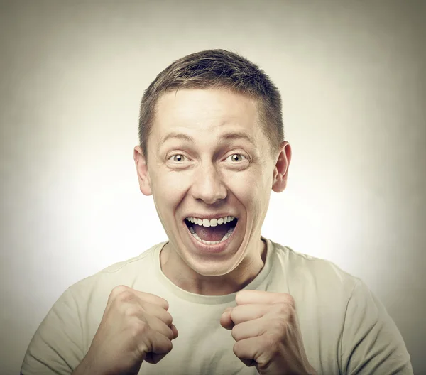 Young man celebrating success. — Stock Photo, Image