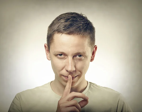 Man showing silent sign. — Stock Photo, Image