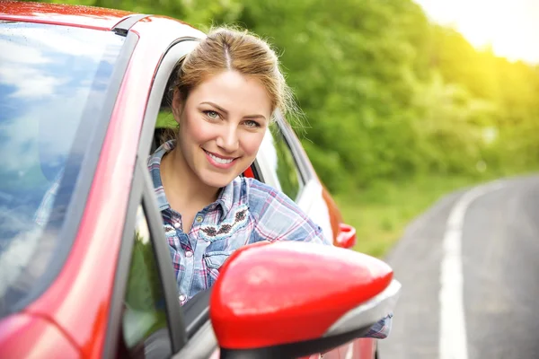 Woman in red car. Royalty Free Stock Photos