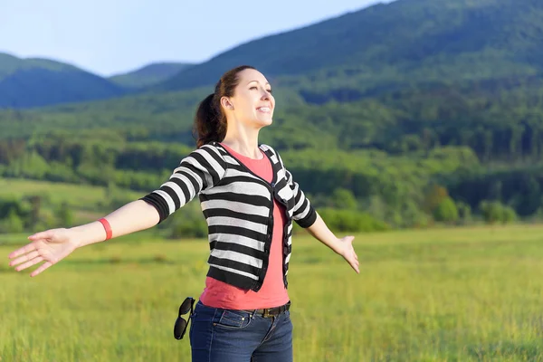 Traveler girl with raised up hands. — Stock Photo, Image