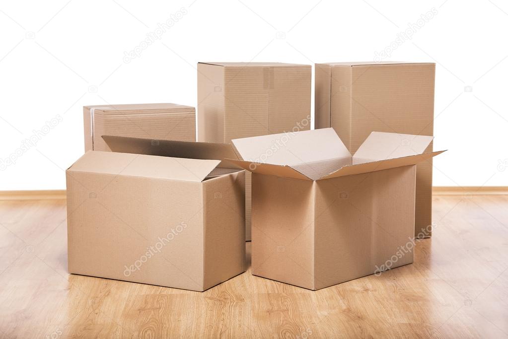 Moving boxes on the floor.