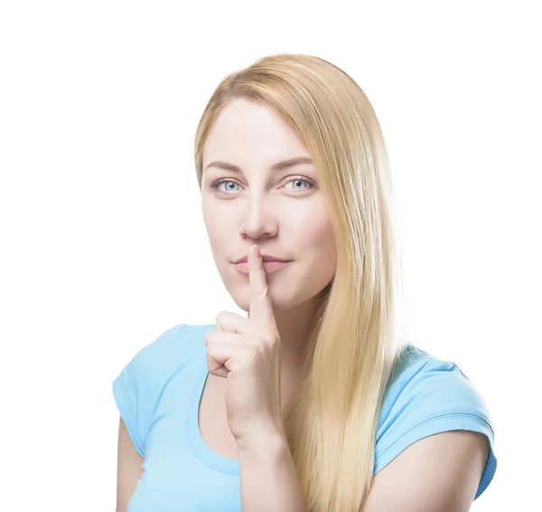 Blonde holding a finger to her mouth. — Stock Photo, Image