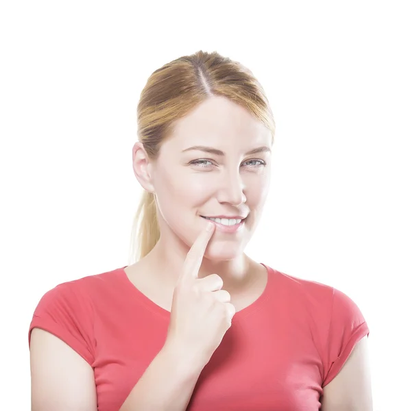 Blonde holding a finger to her mouth. — Stock Photo, Image