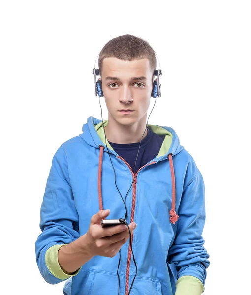 Cara usando telefone com fones de ouvido — Fotografia de Stock
