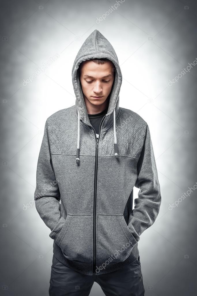 Young man in stylish sweatshirt