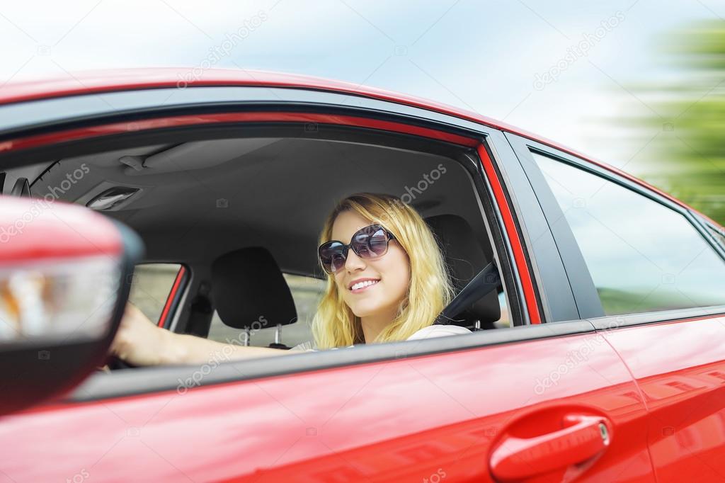 Woman in the car.