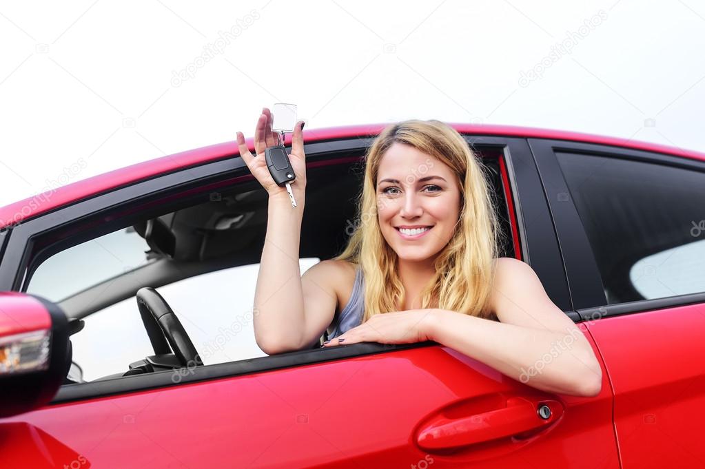 Woman showing keys.