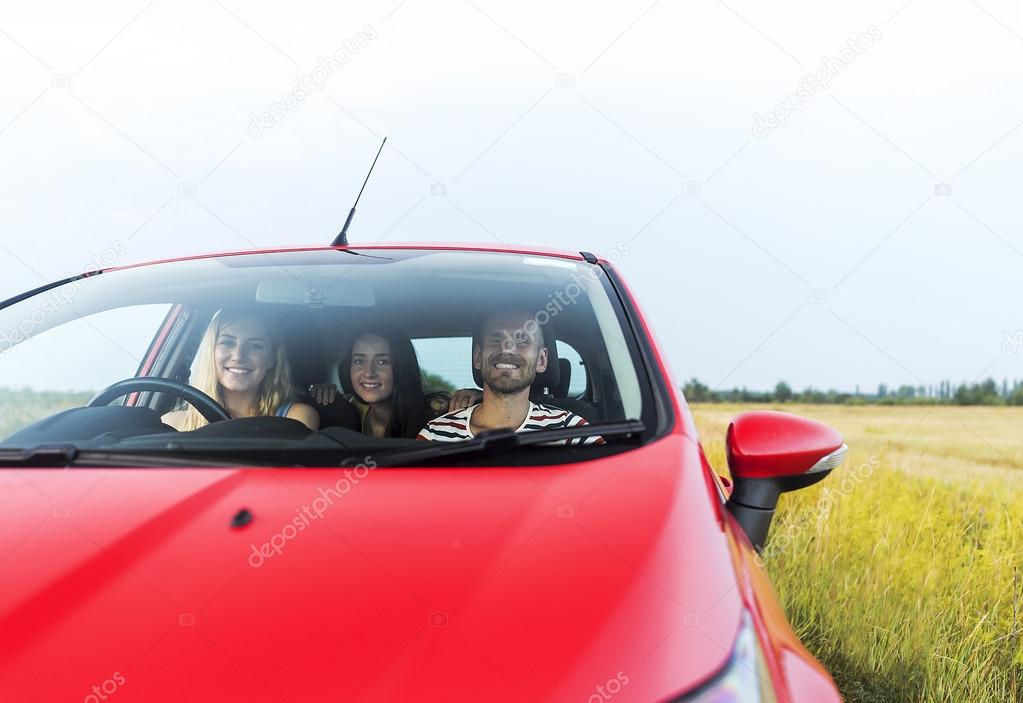 Friends in a car.
