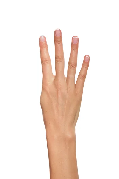 Weibliche Hand zeigt vier Zählungen an. — Stockfoto