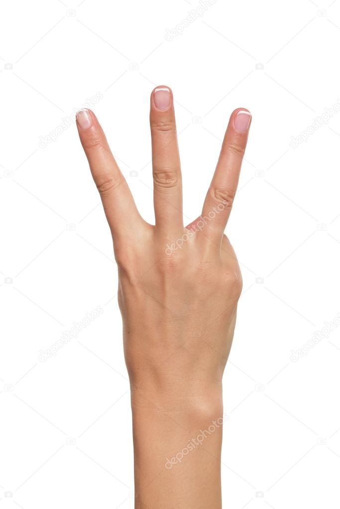 Woman hand showing three fingers.