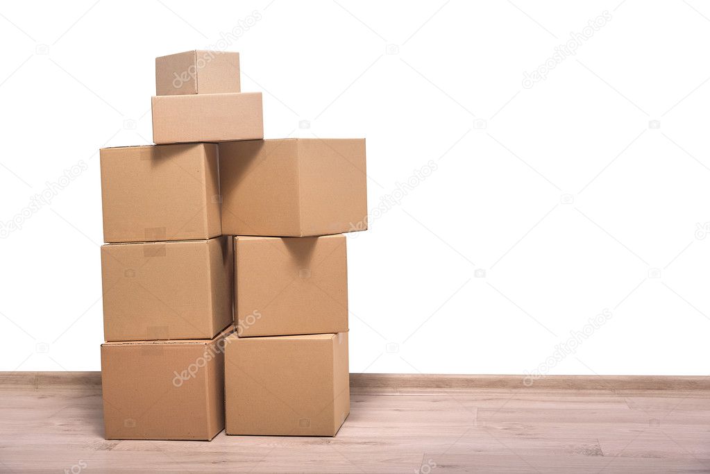 Moving boxes on the floor.