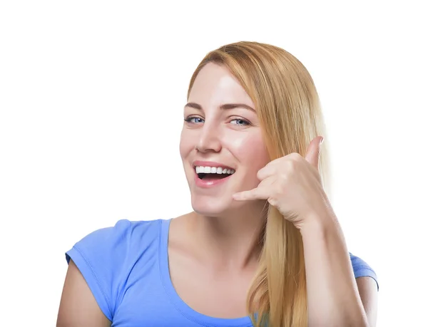 Blonde gesturing phone sign and smiling. Isolated on white. — Stock Photo, Image