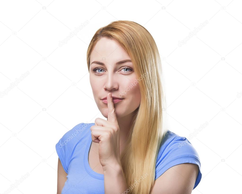 Blonde holding a finger to her mouth.