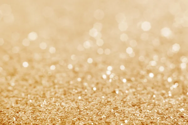 Guld defocused glitter bakgrund. — Stockfoto