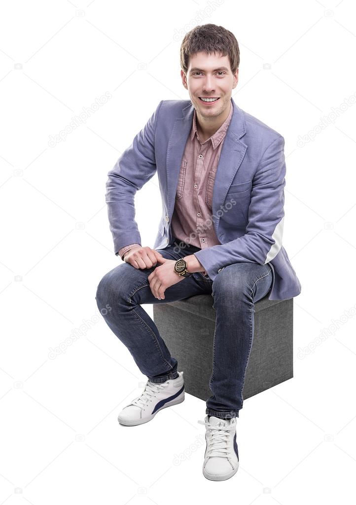 beau jeune homme assis — Photographie believeinme © 95154492