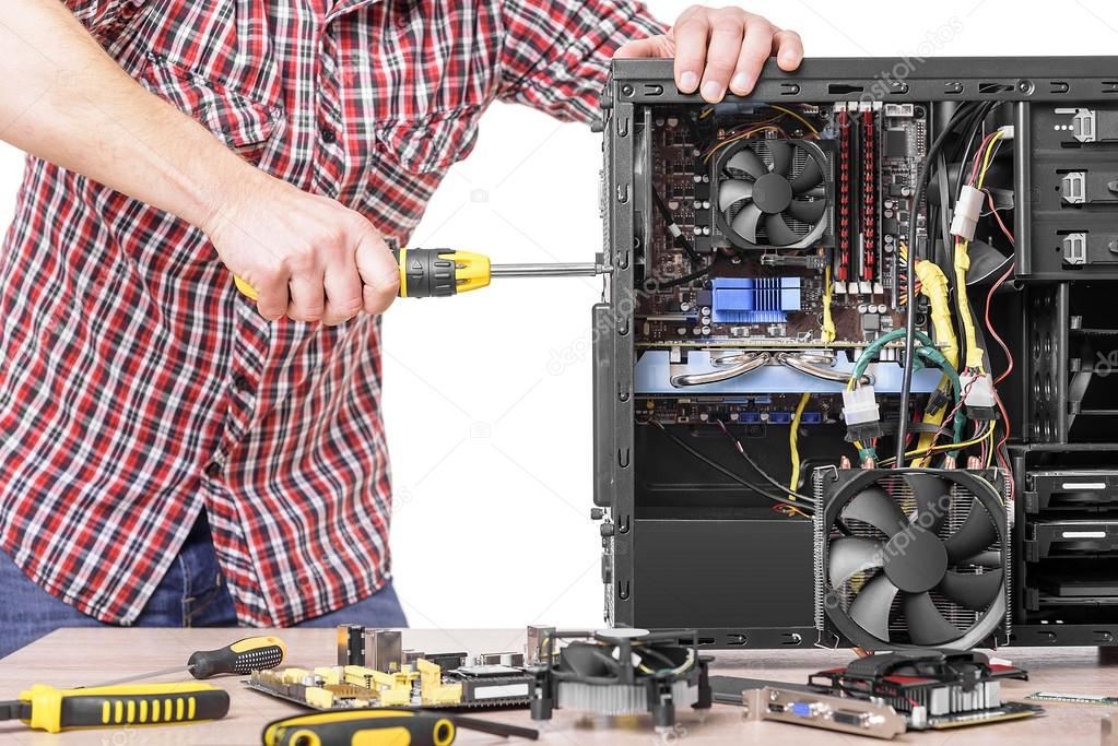 Technician repair assembles computer.