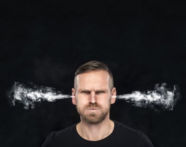 Angry man with smoke coming out from his ears. clipart