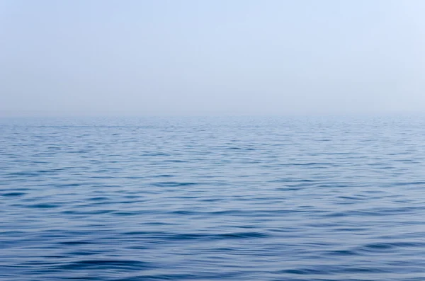Blauwe zee-achtergrond. — Stockfoto