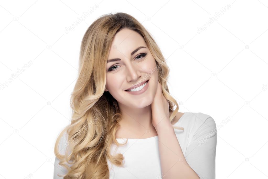Beautiful smiling blonde woman  isolated on white.
