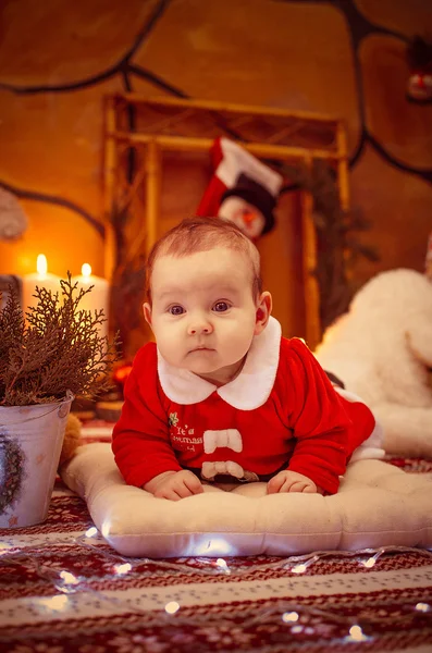 Baby als Weihnachtsmann verkleidet — Stockfoto
