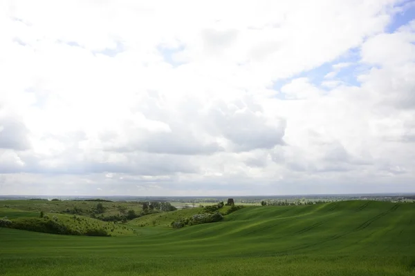 Outside the city - rural landscape - an old windmill on the fiel — Stock Photo, Image