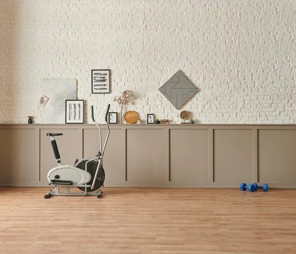 Sport and training room with bike, decorative home background.